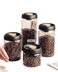 Glass storage jars with coffee beans.