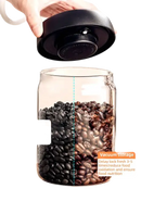 Vacuum-sealed coffee bean storage jar.