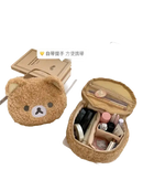 Fuzzy bear-shaped makeup bag.
