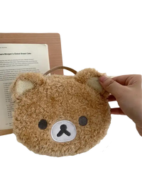 Fuzzy brown bear purse.