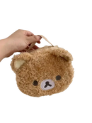 Fuzzy brown bear purse.