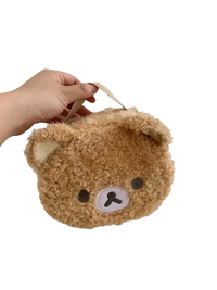 Fuzzy brown bear purse.