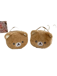 Two fuzzy bear-shaped bags.