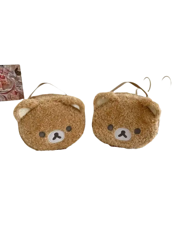 Two fuzzy bear-shaped bags.