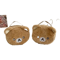 Two brown bear-shaped plush bags.
