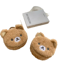 Two fuzzy brown bear-shaped purses.