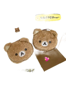 Two fuzzy bear purses.