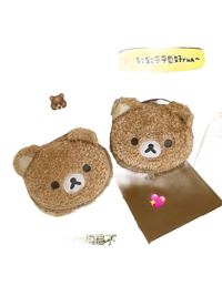 Two fuzzy bear purses.