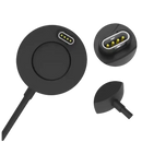 Black circular charging puck with gold-plated pins.