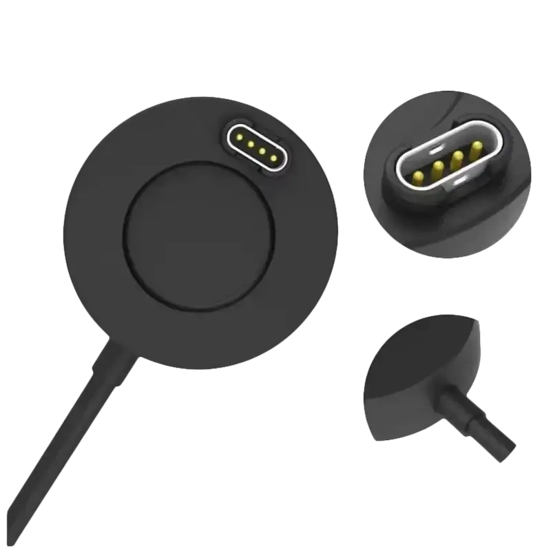 Black circular charging puck with gold-plated pins.