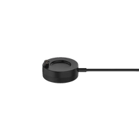 Black circular charging puck with cable.