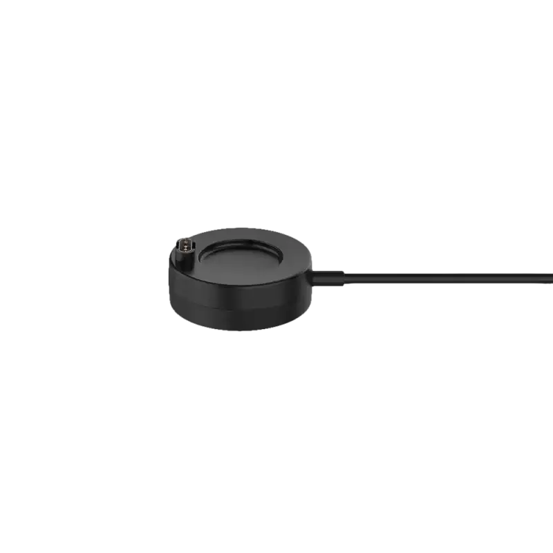 Black circular charging puck with cable.