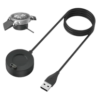 Black magnetic smartwatch charger with USB cable.