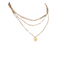 Layered gold-tone necklaces.