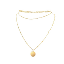 Gold-toned layered necklace with pendant.