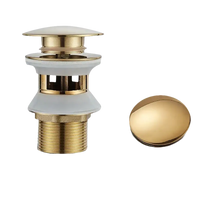 Gold and white sink drain.