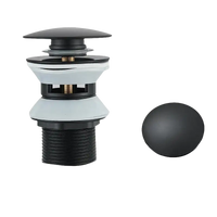 Matte black sink drain assembly.