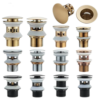 Sink drain stoppers in various finishes.