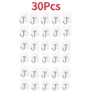 Thirty adhesive hooks on the Grin and Hang transparent door wall hook package
