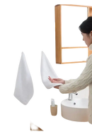 White bathroom towels hanging on a trendy 20pcs self-adhesive transparent door wall hook