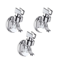 Three chrome shower head holders on the handheld Shower Head Happy Home adjustable shower rack with vacuum suction cup