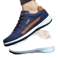 Blue and brown leather sneakers.