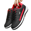 Black and red leather sneakers.