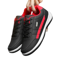 Black and red leather sneakers.