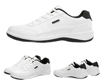 White leather sneakers with black accents.
