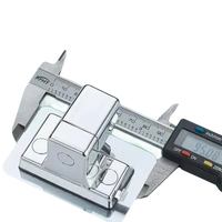 Chrome-plated metal hook with digital caliper.