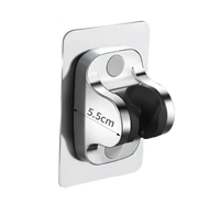 Chrome shower head holder with adhesive backing.
