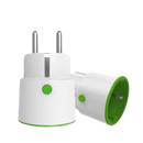 White Zigbee power plugs with green accents.
