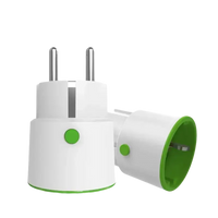 White Zigbee power plugs with green accents.