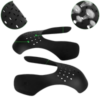 Black shoe shields with ventilation holes.