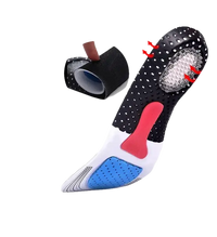 Shoe insole with ventilation holes and shock absorption features.