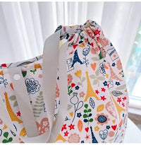 Floral Paris-themed tote bag.