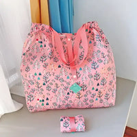 Pink patterned reusable shopping bag.