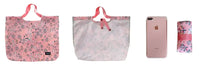 Reusable shopping bags and a phone.