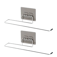 Two metal towel racks on Homerack Toilet Towel Rack and Paper Holder Roll setup