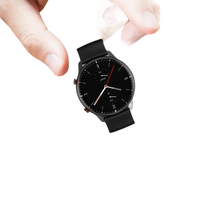 Black smartwatch with a round face.