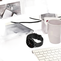 Black smartwatch with matching band.