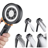 Black handheld shower head with multiple spray modes.