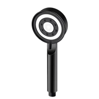 Black handheld shower head with dimensions.