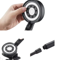 Black handheld shower head.