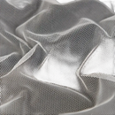 Wrinkled white hexagonal mesh fabric.