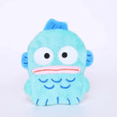 Cartoonish blue fish plush toy.