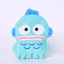 Turquoise plush fish toy.