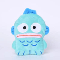 Turquoise plush fish toy.