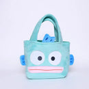 Turquoise plush fish tote bag.
