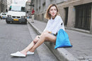Blue drawstring bag.